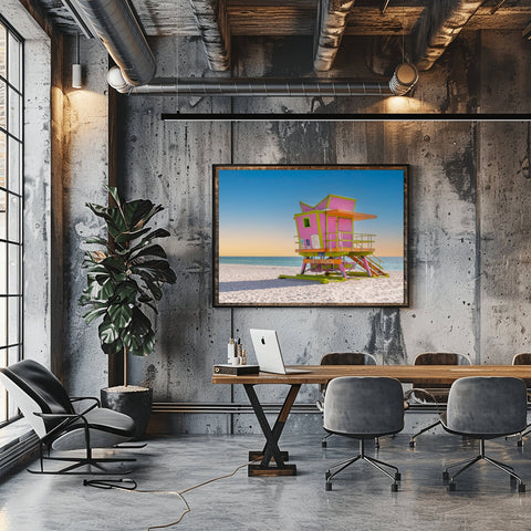 The 46th Street lifeguard tower in Miami Beach at sunrise, with golden light hitting the structure and soft blue sky.