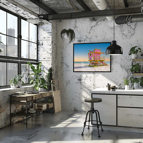 The 46th Street lifeguard tower in Miami Beach at sunrise, with golden light hitting the structure and soft blue sky.