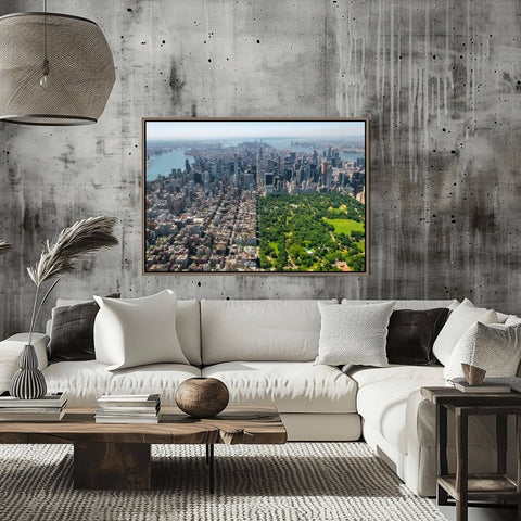 An aerial photograph of Central Park showing the Great Lawn and surrounding skyscrapers from a helicopter perspective.