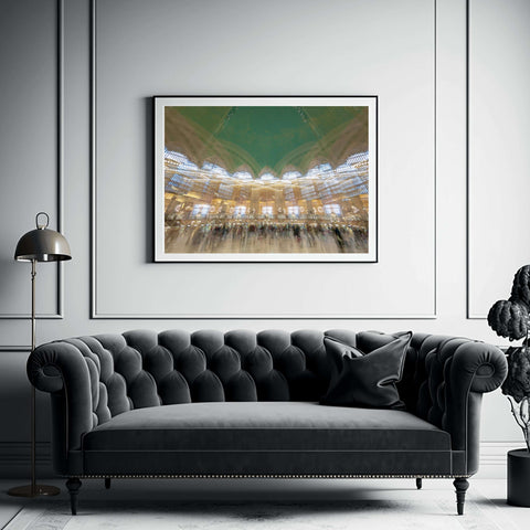 Abstract multi-exposure photo of Grand Central Terminal interior with the green zodiac ceiling and blurred commuters in motion by Richard Silver.