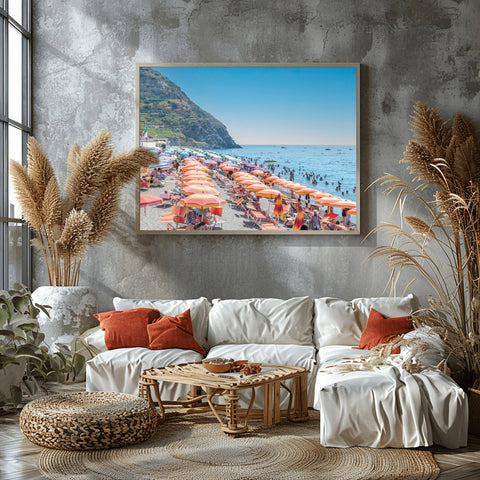 A wide vertical view of rhythmic orange beach umbrellas on the dark volcanic sand of Spiaggia dei Maronti in Ischia, Italy.