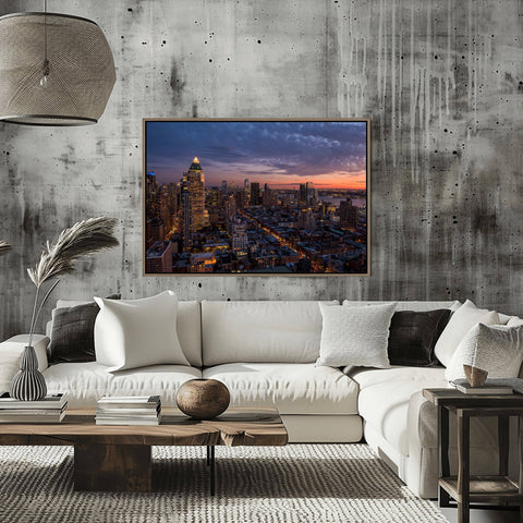 A rooftop sunset view of the West Side of Manhattan, looking toward the Hudson River and New Jersey.