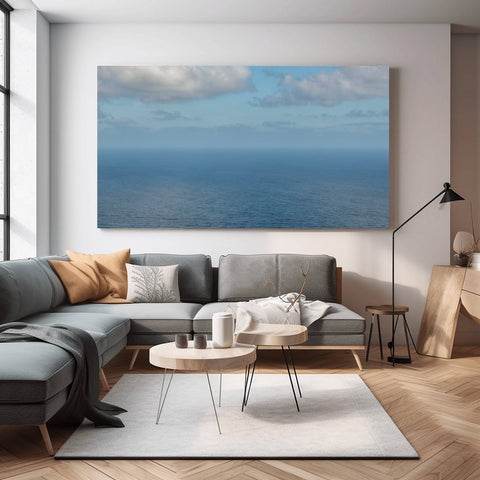 A minimalist horizontal view of the deep indigo Atlantic Ocean horizon in the Azores, Portugal, featuring a crisp meeting of sea and sky.
