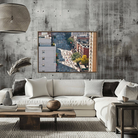 Tilt shift photography of the New York City Marathon, showing thousands of tiny-looking runners passing through the city streets