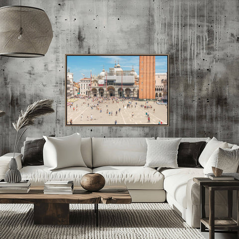 Tilt shift view of St. Mark's Square in Venice, Italy, showing the basilica and pigeons as part of a tiny model world.
