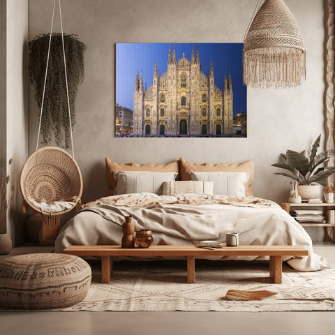 A Time Slice photograph of the Milan Cathedral (Duomo di Milano) in Italy, showing the marble spires transitioning from day to night.
