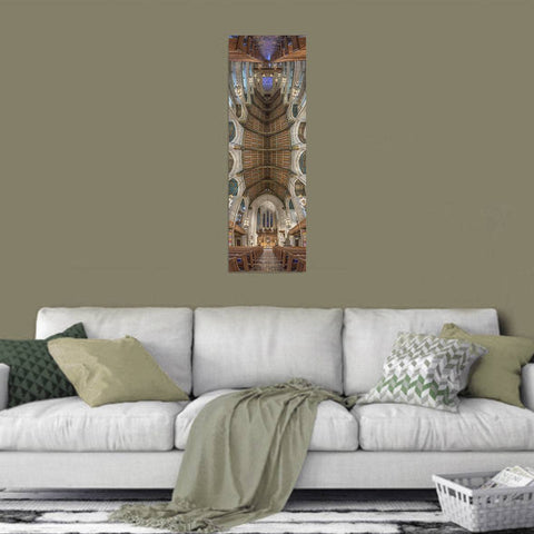 Vertical panorama of the Fourth Presbyterian Church in Chicago, Illinois, showing the dark wood pews and the colorful painted ceiling.