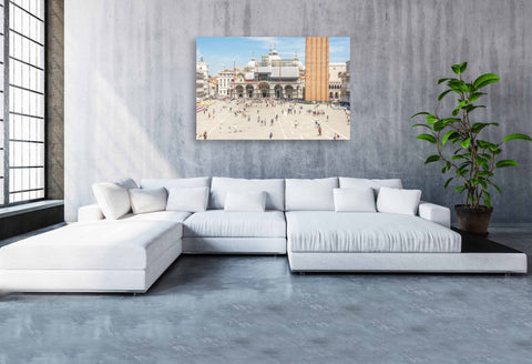 Tilt shift view of St. Mark's Square in Venice, Italy, showing the basilica and pigeons as part of a tiny model world.