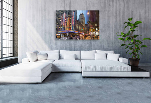 A Time Slice photograph of Radio City Music Hall in New York City, showing the Art Deco marquee and neon signs transitioning from day to night.